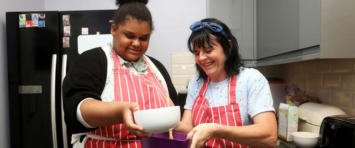 understanding behaviour that challenges with two ladies in a kitchen baking together